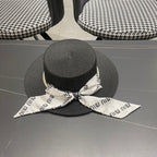 MM SMALL-BRIM STRAW HAT IN BLACK AND PEARL EMBELLISHED