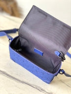 STEAMER 18 IN SAPPHIRE BLUE MONOGRAM EMBOSSED TAURILLON
