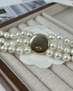 CC ROUND BUTTON RESIN BRACELET WITH THREE LAYERS OF PEARLS