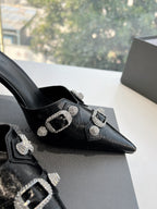 CRYSTAL BUCKLE BLACK WAX-OIL SHEEPSKIN HEELED MULES