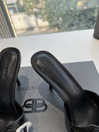 CRYSTAL BUCKLE BLACK WAX-OIL SHEEPSKIN HEELED MULES