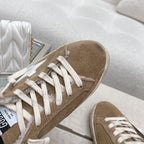THICK-SOLED SUPER-STAR SABOTS IN BROWN SUEDE WITH WHITE STAR