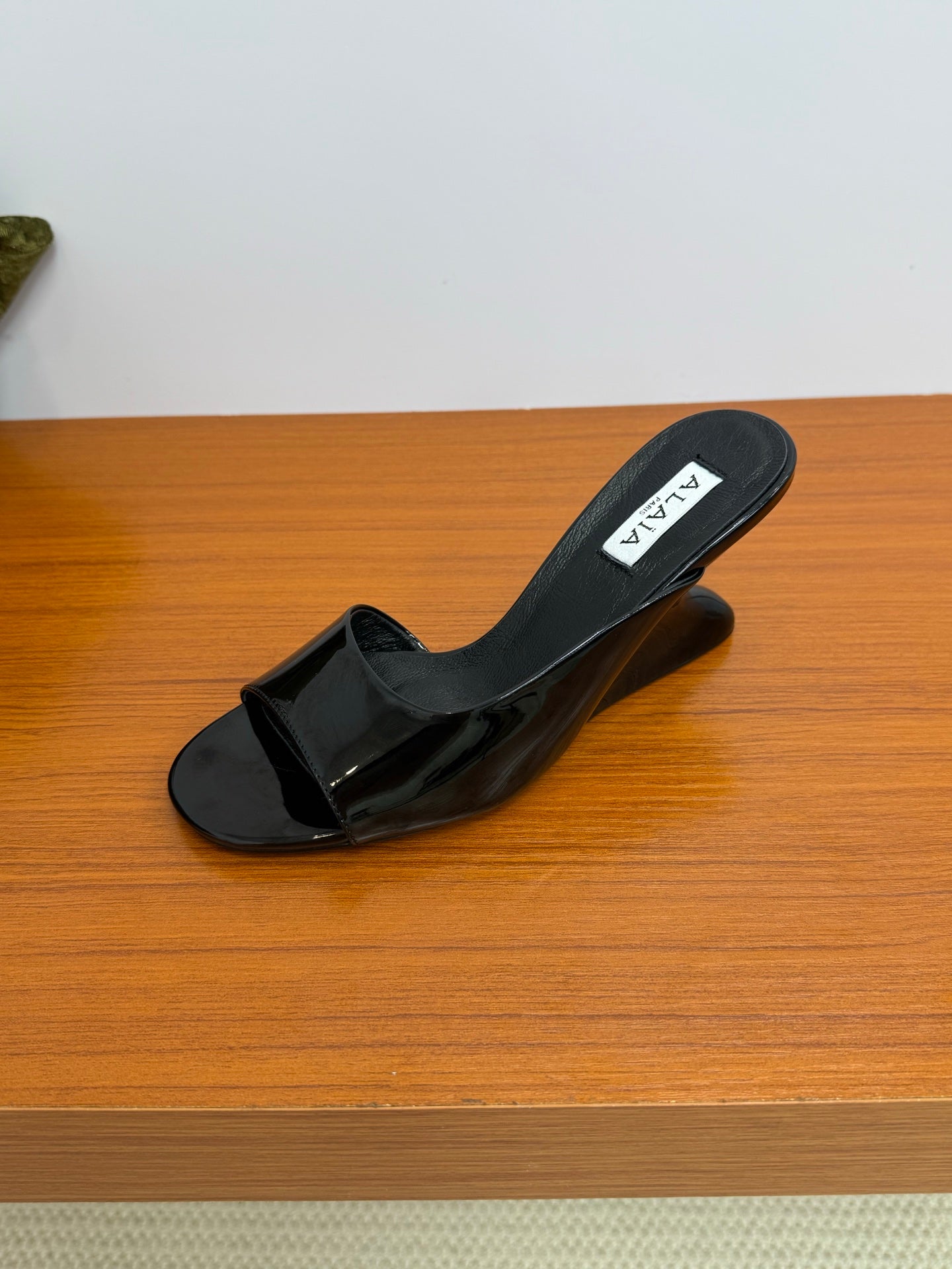 ALAIA WEDGE SANDALS 25S IN BLACK LAMBSKIN
