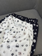ALL-OVER LOGO PRINTED PANTS WITH STRETCH WAIST