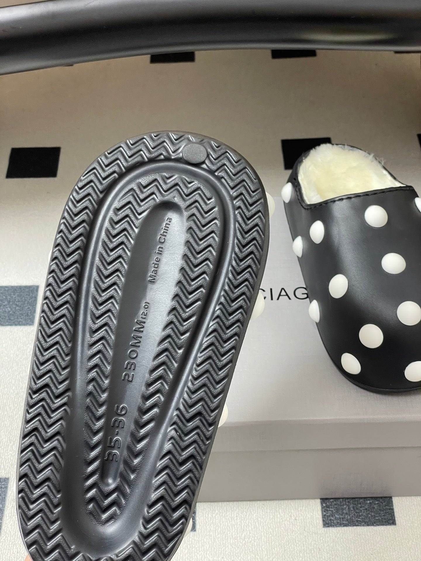 BALENCIAGA 25S FUR-LINED MULES IN BLACK AND WHITE FAUX LEATHER