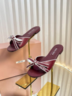 SLIDES SANDALS IN BURGUNDY RED CALFSKIN BOW IN TRAP
