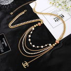 CHANEL 25S GOLD CHAIN BELT WITH PEARL 611794