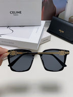 TRIOMPHE SUNGLASS 497820 IN GOLD METAL BLACK LENSES