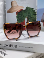 TRIOMPHE SUNGLASS 497830 IN HAVANA ACETATE EMBOSSED LOGO