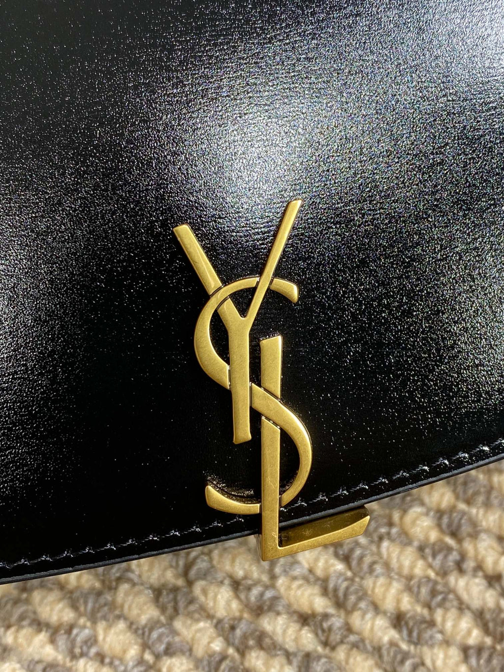 VOLTAIRE HALF-MOON SHOULDER BAG 24 IN BLACK CALFSKIN GOLD METALLIC