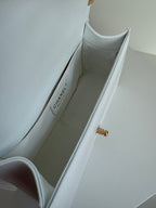 CHANEL BOY 25S 25 CM IN WHITE LAMBSKIN WITH GOLD HARDWARE