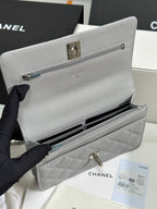 FLAP BAG WITH SILVER-TONE HANDLE 19 IN GREY SHINY CAVIAR SKIN