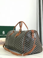 BOSTON 50 BAG IN BLACK GOYARDINE CANVAS AND TAN CALFSKIN TRIM