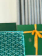 SÉNAT MGM POUCH 40 IN GREEN GOYARDINE CANVAS