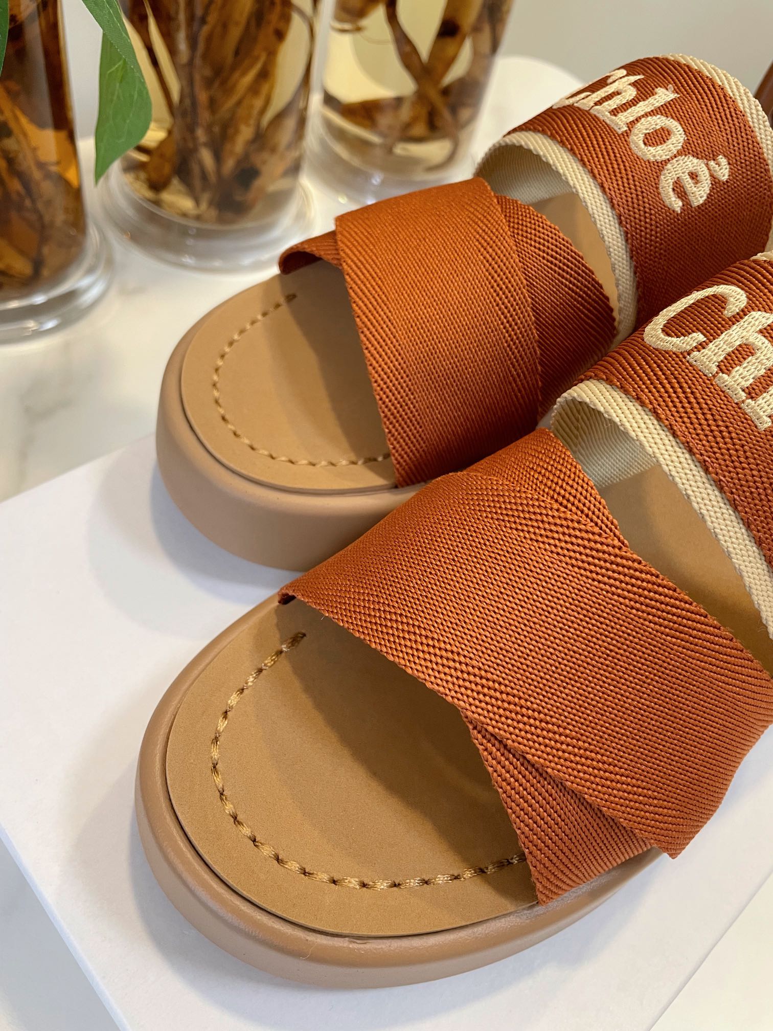CHLOÉ WOODY WEDGE SANDALS IN BRONZE BROWN CANVAS WITH CIDER BROWN RUBBER SOLE