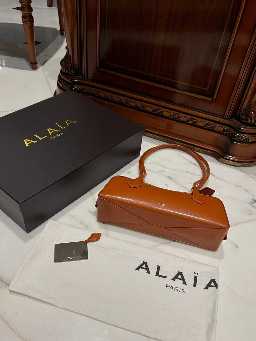 LE TECKEL MEDIUM BAG 33 IN BRONZE ORANGE GOATSKIN
