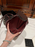 LE COEUR BAG 21 IN BURGUNDY RED STUDDED CALFSKIN
