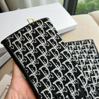 TOUCHSCREEN GLOVES IN BLACK MIX WHITE LAMBSKIN AND MONOGRAM JACQUARD FABRIC 465792