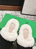 REGGIE SLIPPER IN BLACK SUEDE AND SHEARLING LINING