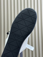 PRADA 25S COLLAPSE MULES IN WHITE CALFSKIN