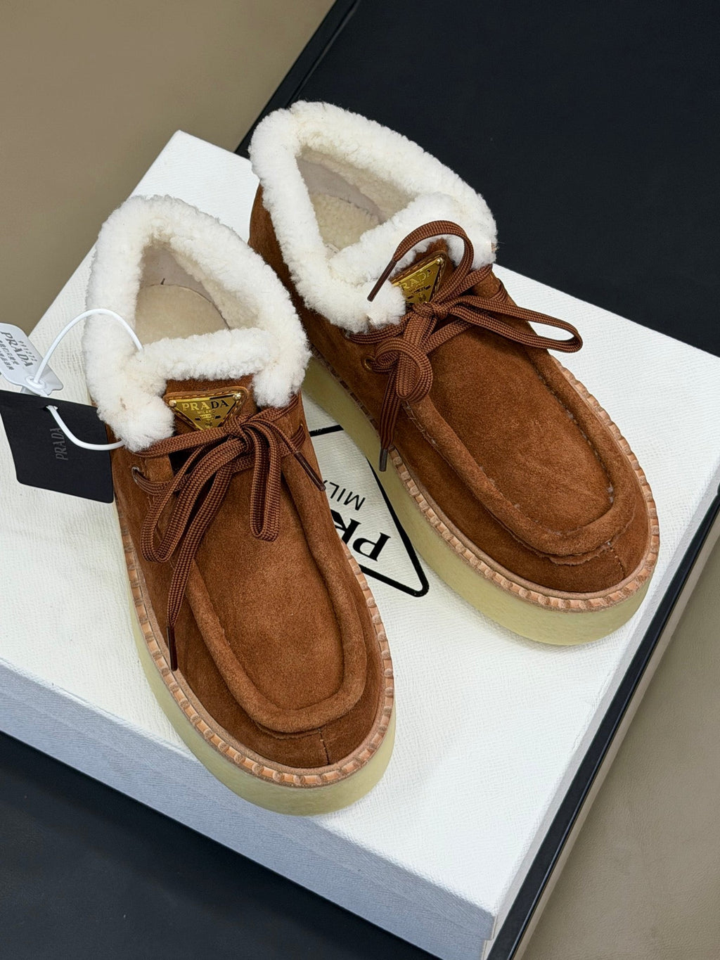 PRADA 25S HIGH-TOP SHOES 40 MM IN DARK BROWN SUEDE SHEARLING-LINED