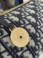 CD East-West cylindrical bag 27 blue jacquard canvas