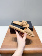 ALAIA FLAT SANDALS WITH PERFORATED STRAPS 25S IN BEIGE SUEDE