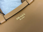 PRADA 25S BUCKLE MEDIUM HANDBAG 28 IN CARAMEL CALFSKIN GOLD HARDWARE