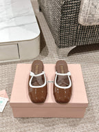 FLAT MULE IN CHOCOLATE BROWN PATENT CALFSKIN