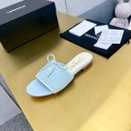 BOW SLIPPERS IN LIGHT BLUE LAMBSKIN