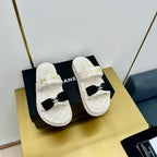 DAD SANDALS WITH BOW IN WHITE LAMBSKIN MULE