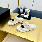 DAD SANDALS WITH BOW IN WHITE LAMBSKIN MULE