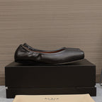 ALAIA BALLET FLATS IN BLACK SMOOTH CALFSKIN