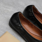 ALAIA BALLET FLATS IN BLACK SMOOTH CALFSKIN