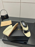 ALAIA WEDGE THONG SANDALS 25S IN LIGHT BEIGE RAFFIA