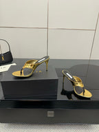 ALAIA HEELED THONG 25S IN GOLD PATENT LEATHER