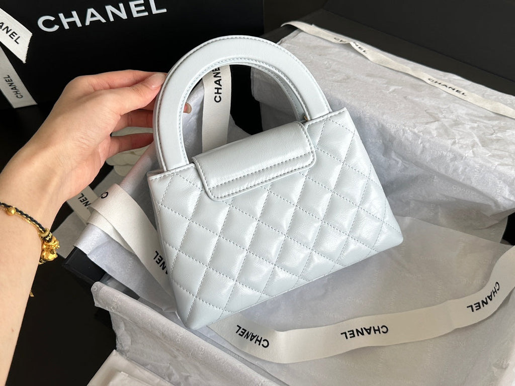 CHANEL  KELLY 25S 19 CM IN PASTEL MINT GREEN LAMBSKIN WITH GOLD HARDWARE