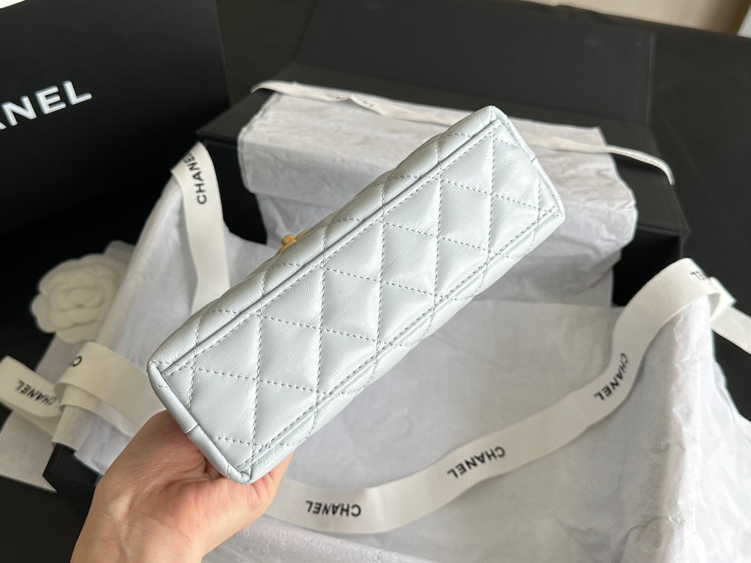 CHANEL  KELLY 25S 19 CM IN PASTEL MINT GREEN LAMBSKIN WITH GOLD HARDWARE