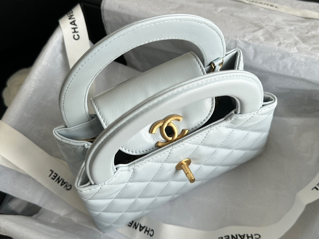 CHANEL  KELLY 25S 19 CM IN PASTEL MINT GREEN LAMBSKIN WITH GOLD HARDWARE