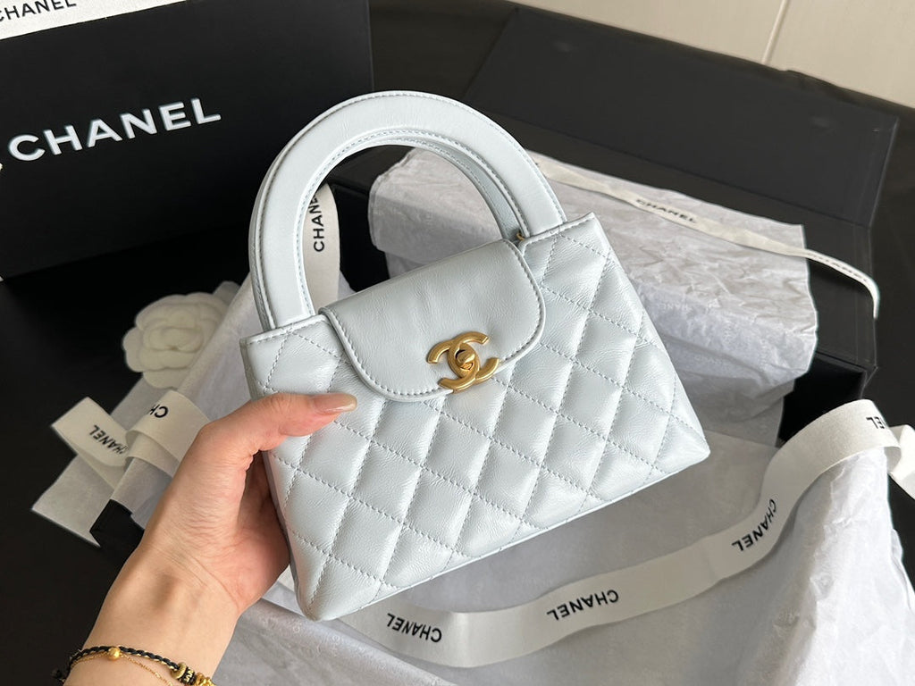 CHANEL  KELLY 25S 19 CM IN PASTEL MINT GREEN LAMBSKIN WITH GOLD HARDWARE