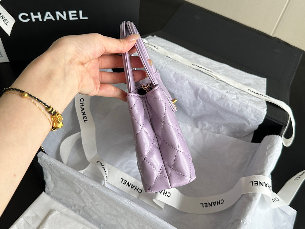 CHANEL  KELLY 25S 19 CM IN PURPLE LAMBSKIN WITH GOLD HARDWARE