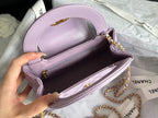 CHANEL  KELLY 25S 19 CM IN PURPLE LAMBSKIN WITH GOLD HARDWARE