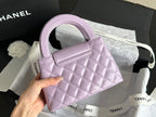 CHANEL  KELLY 25S 19 CM IN PURPLE LAMBSKIN WITH GOLD HARDWARE