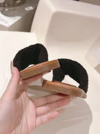 CELINE 25S LYMPIA TWISTED SANDAL IN BLACK SPONGE FABRIC