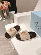PRADA 25S FLAT MULES IN CREAM AND DARK BROWN RABBIT FUR