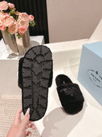 PRADA 25S FLAT MULES IN BLACK RABBIT FUR