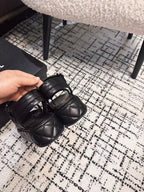 THICK-SOLED THONG SANDAL IN BLACK LAMBSKIN