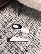 FLAT MULES IN WHITE CALFSKIN