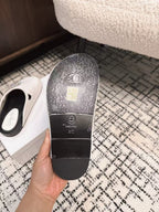 FLAT MULES IN WHITE CALFSKIN
