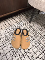 FLAT MULE IN SEPIA BEIGE CALFSKIN